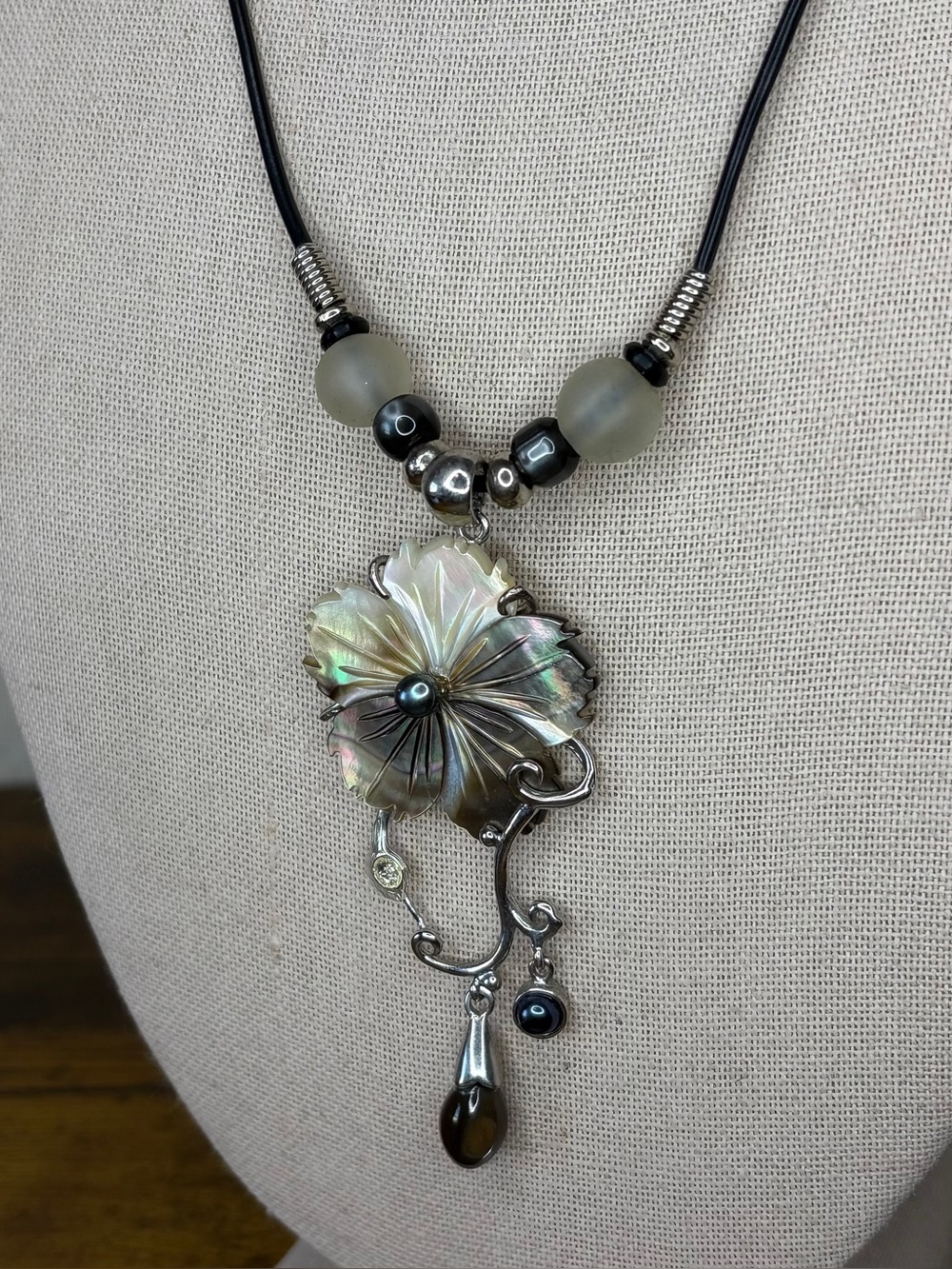 Artisan Mother of Pearl Flower Pendant Necklace on Black Cord - Picture 2 of 8